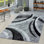 Tapis gris / noir en polypropylène tissé à la machine à motif abstrait Andalasia