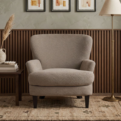 Fauteuil club rembourré avec pieds