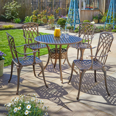 Denali 4 - Person Patio Dining Set with Round Table