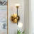 Neydi 2 - Light Dimmable Gold/Black LED Wallchiere