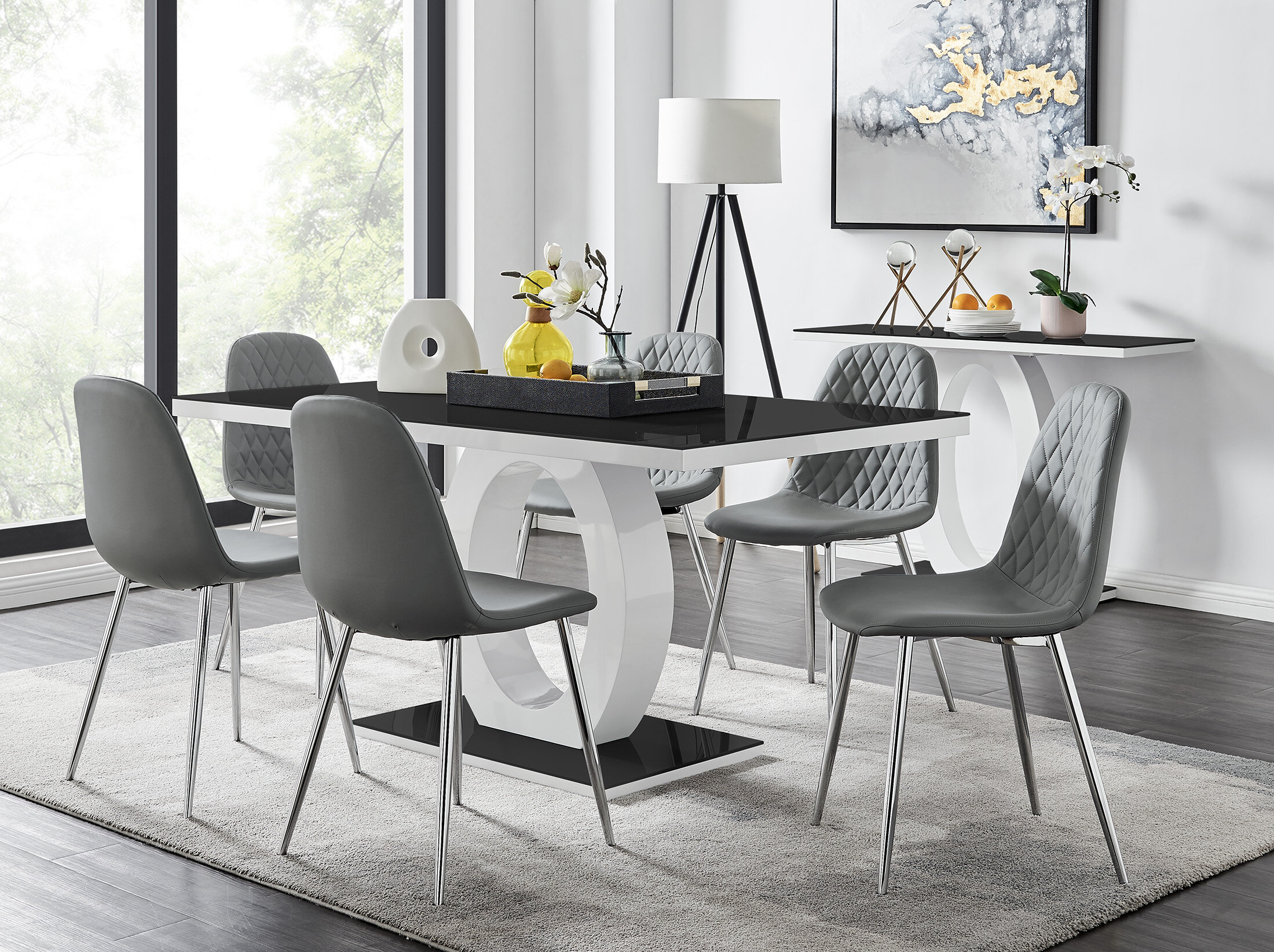 https://assets.wfcdn.com/im/30804017/compr-r85/1237/123767401/scottsmoor-modern-high-gloss-halo-6-seater-dining-table-set-with-luxury-faux-leather-dining-chairs.jpg