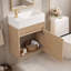 Meuble-lavabo suspendu de 47 cm (18,5 po) avec lavabo réversible en résine (gauche ou droite) et porte à ouverture par simple pression