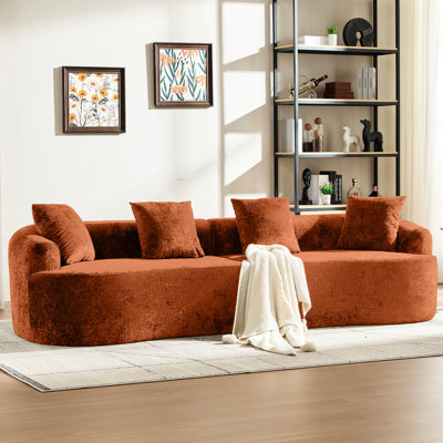 Canapé incurvé en chenille orange, 3 coussins, assise profonde idéale pour l'appartement, aucun assemblage requis, mousse à mémoire de forme pour une détente optimale dans le salon, et convient aux animaux de compagnie.