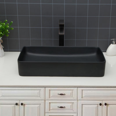 Lavabo vasque de salle de bain rectangulaire en céramique noire 24 po x 13,5 po, aspect élégant, drain standard en acier inoxydable, installation simple et essuyage classique,