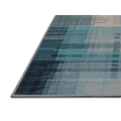 Tapis gris lavable à la machine