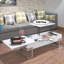 Table basse ultrabrillante et chromée avec plateau relevable