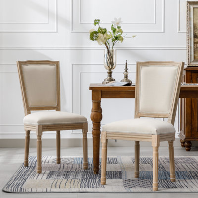 French Style Dining Chairs In Cream Of 2 . Solid Wood, Linen. Ergonomic, Long-Lasting Wood Frame With Linen Upholstery. Ergonomic Back Support. Styl
