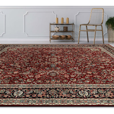 Tapis bleu marine et vin de haute qualité noué à la main