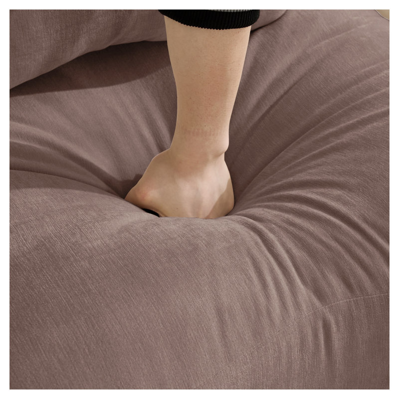 Pouf rembourré en chenille couleur Rose Poudré - Repose-pieds moderne de 77 cm de large avec design ergonomique incurvé