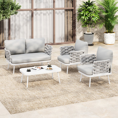 Patio conversation de 4 pièces en gris, coussins en mousse haute densité pour plus de confort, structure, corde tissée à la main, look sophistiqué, housses de coussins faciles à nettoyer, tons extérieurs, gris
