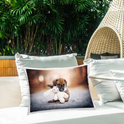 Puppy with Stuffed Bunny Outdoor Printed Pillow by Natalie Grosse