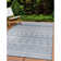 Jezeniah Southwestern Blue / Cream Indoor & Outdoor Area Rug