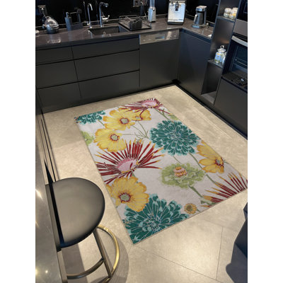 Tapis décoratif moderne et multicolore à motifs floraux beiges