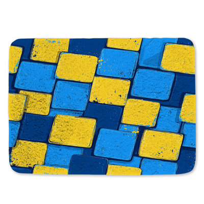Tapis de bain jaune et bleu