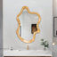 Miroir mural de forme irrégulière