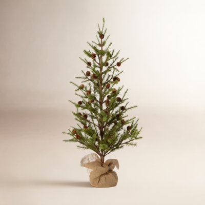 Stacy Faux Pine Tree in Wicker/Rattan Pot