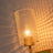Dimmable Armed Sconce with Prismatic Glass Shade