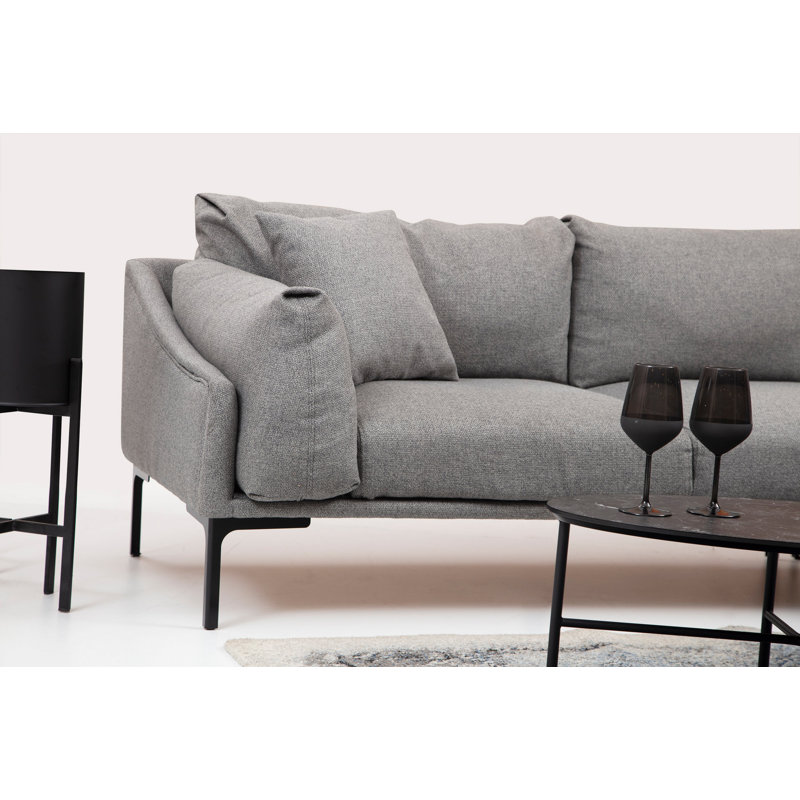 Élégant canapé d'angle avec structure en bois de hêtre et pieds en métal noir, revêtement 100% polyester gris, tissu 100% nettoyable à sec | Dimensions: 100,4 po x 59,1 po x 25,6 po | Comprend 2 coussins, parfaits pour les décors industriels et scandinaves