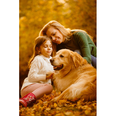 Mère et fille avec leur chien par Fotostorm