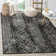Pateley Geometric Area Rug