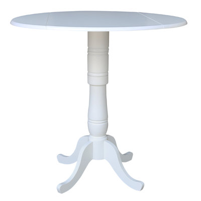 Hesston Extendable Round Solid Wood Dining Table