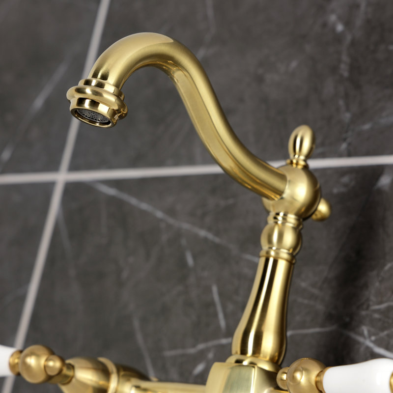 Kingston Brass Heritage Double-Handle 2-Hole Wall-Mount Bridge Kitchen Faucet, Brushed Brass