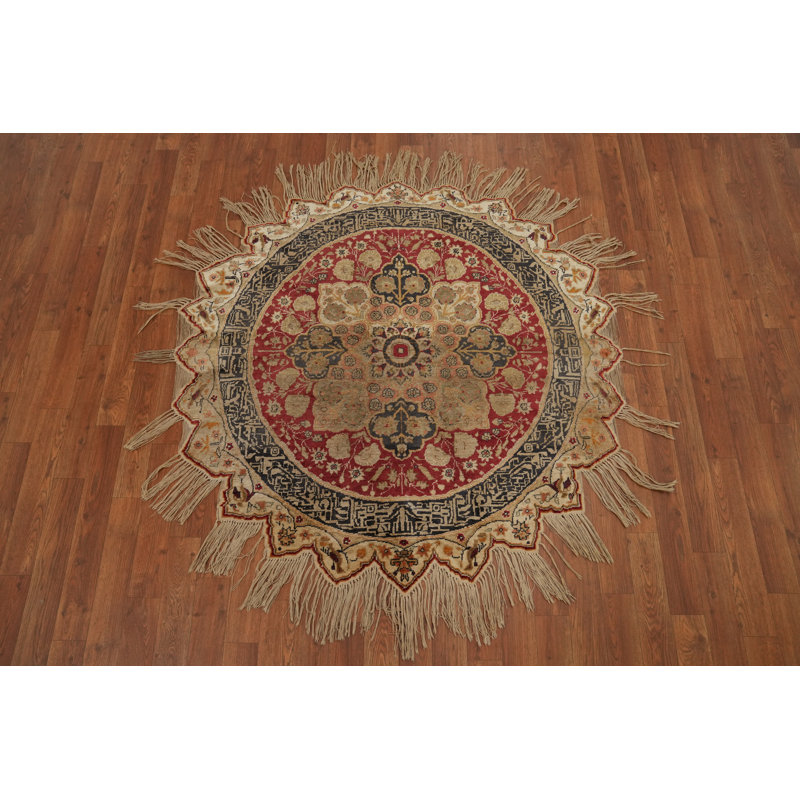 Tapis rond teint en soie antique