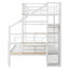 Lit superposé simple au dessus d'un lit double en métal avec escalier de rangement et garde-robe ouverte, blanc