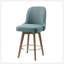 Élégant tabouret de comptoir rembourré bleu avec siège pivotant et dossier capitonné, parfait pour les salles à manger modernes.