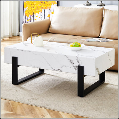 47.2"x23.6"  and Minimalist MDF Marble-Patterned Coffee Table.White marble pattern sticker, metal leg spray coating,MDF Coffee table.Showcasing a modern and simple style.