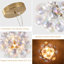 Lustre moderne en laiton 4 lumières avec abat-jour ovales en verre iridescent-1643421878-1630537163