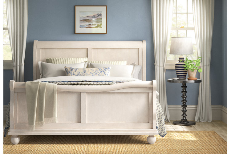 coastal bedroom with a traditional-style bed