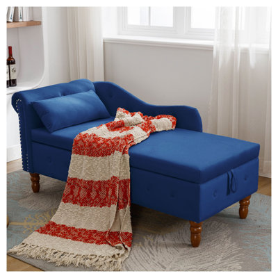 Chaise longue en velours bleu marine avec rangement, méridienne capitonnée à accoudoirs arrondis avec garniture cloutée et coussin pour chambre ou salon