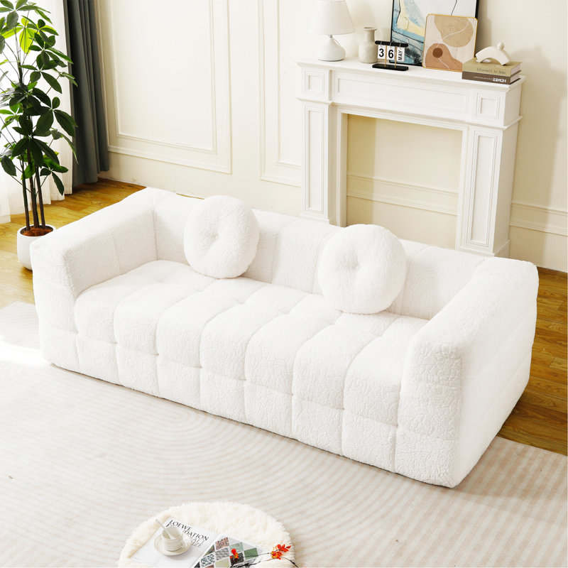 Canapé moderne 3 places en mousse, 84,6 cm, sans os, avec deux coussins ronds décoratifs, en polyester à poils longs doux au toucher, texture litchi, motif à carreaux.