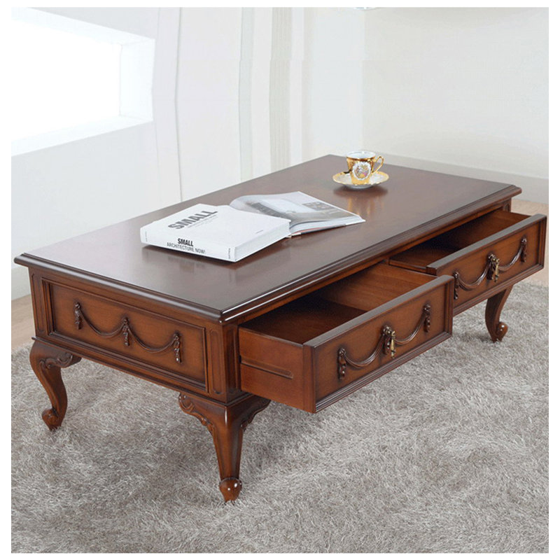 Carved mahogany coffee table
