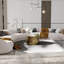 Table basse de salon embossée en or brossé