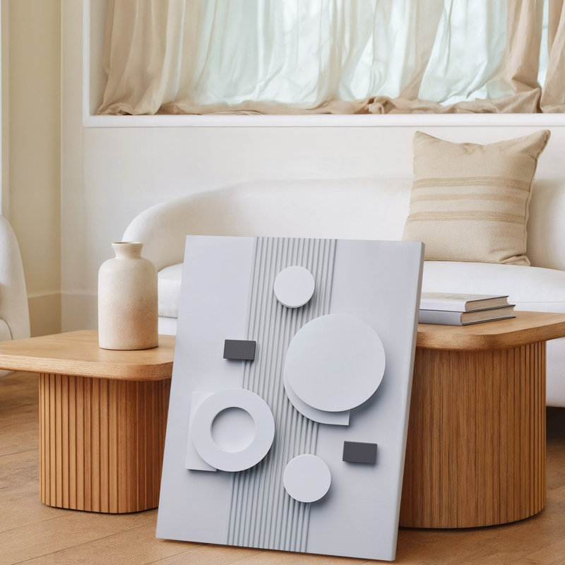 Toile, composition minimaliste mettant en vedette une série de formes circulaires blanches de tailles variées et quelques petites impressions sur toile géométriques foncées