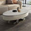 Table basse ovale en acier inoxydable et bois fritté noir crème-1691612775