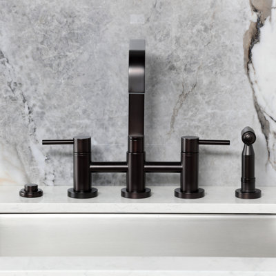 Kingston Brass Concord Two-Handle 4-Hole Deck Mount Bridge Kitchen Faucet with Brass Side Sprayer
