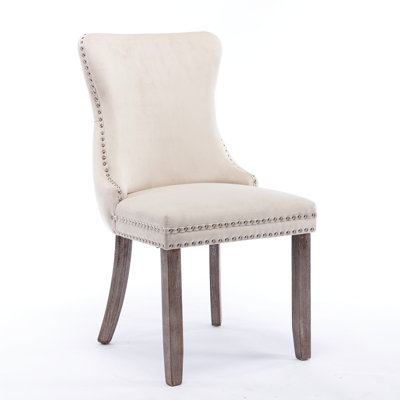 Chaise de salle à manger rembourrée beige avec 2 chaises Pieds en bois massif. Dossier haut pour un confort accru. Siège rembourré en mousse. Chevilles réglables. Sw8809bg 2 pièces Bois. Coussin rembourré.