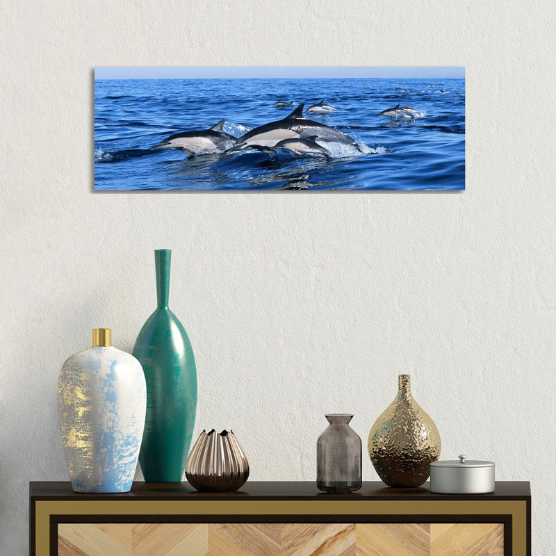 Common Dolphins Breaching In The Sea - Wrapped Canvas Panoramic Print, 30.48 cm H x 91.44 cm W x 1.91 cm D