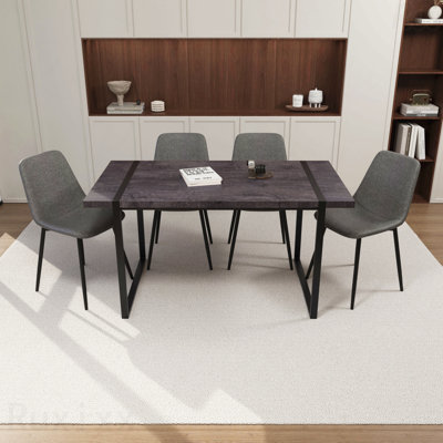 Ensemble de salle à manger 5 pièces: table en bois aggloméré noir 59 po et 4 chaises en suède, base rectangulaire en métal