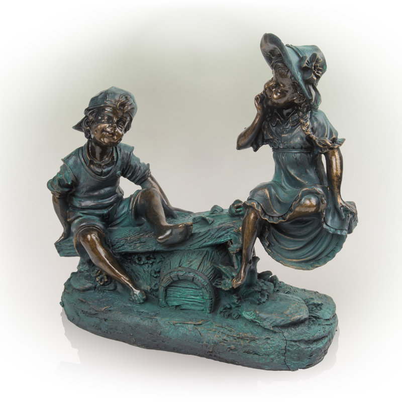 Statue de Yadiel fille et garçon jouant sur le balançoire à bascule