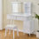 Bureau de coiffeuse moderne avec lumières à DEL et miroir, ensemble de coiffeuse 4 tiroirs avec tabouret, luminosité à intensité variable de 3 couleurs, peu encombrant pour la chambre à coucher