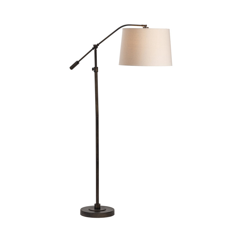 Lampe sur pied noire et bronze avec abat-jour cylindrique en lin.