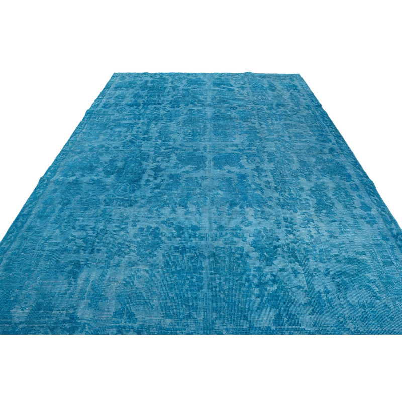 Tapis bleu Kalmanovitz