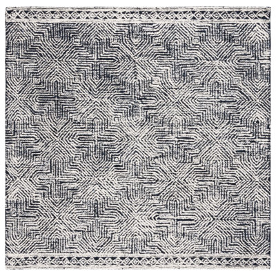 Friedi Tufted Wool/Pet Yarn Geometric Rug in Ivory/Black