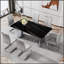 Table de salle à manger moderne et minimaliste avec verre imitation marbre noir, résistante à la chaleur et spacieuse pour des rassemblements élégants.
