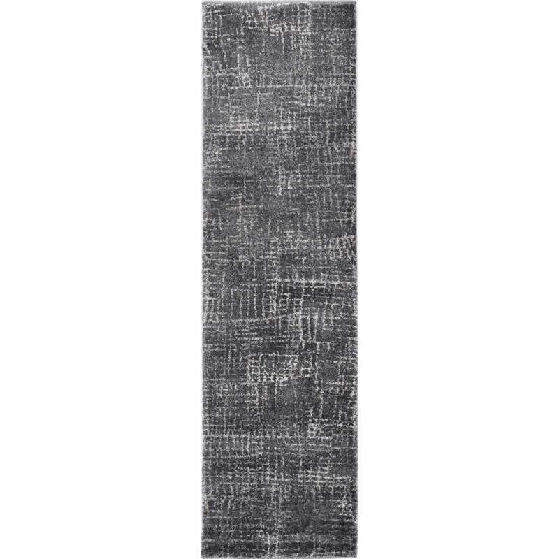 Tapis gris à motif abstrait