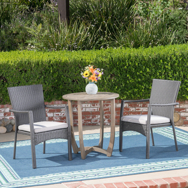 Sade 2 - Person Acacia Wicker Patio Dining Set with Round Table , Cushions Included